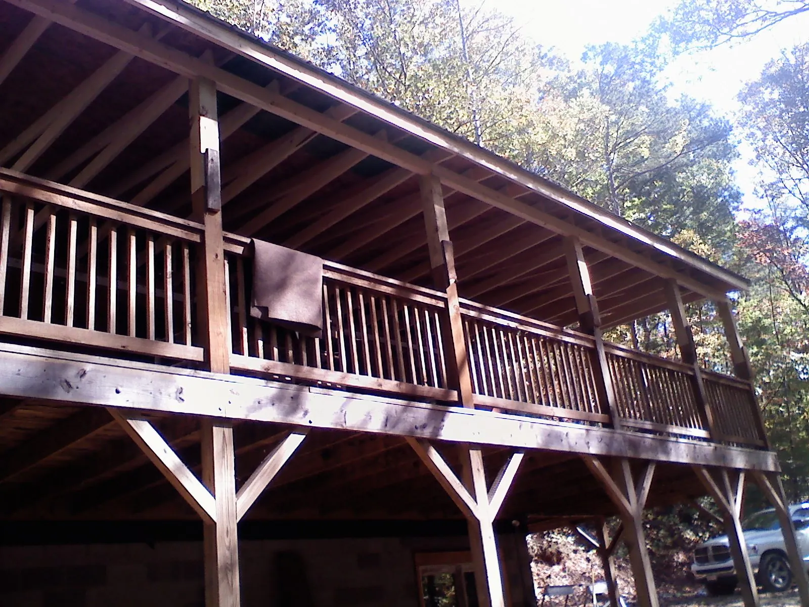 Timber framing under a new elevated porch and deck — Roof Leak Repair in North Dartmouth by Roofing Brothers